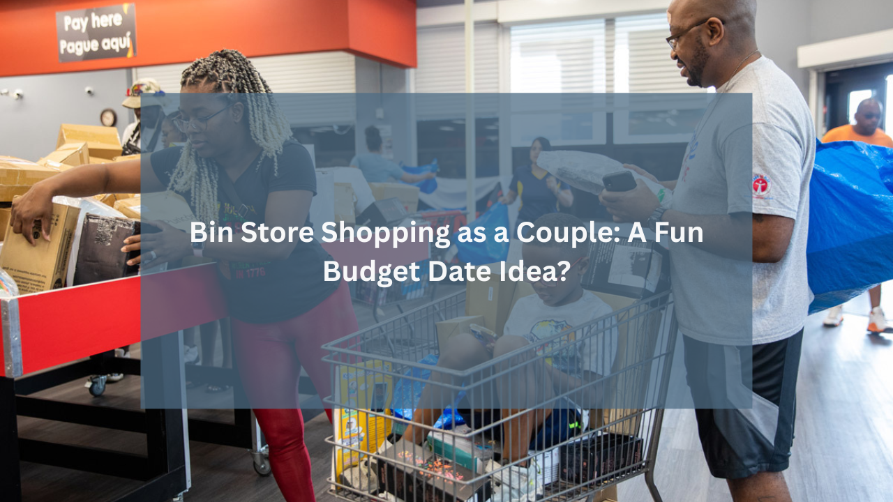 A couple shops together at a busy bin store, examining discounted items and placing them in a shopping cart while their child sits inside the cart.